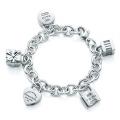 Tiffany Icons Lock Charm Bracelet. Sterling Silver. 7.5" long.